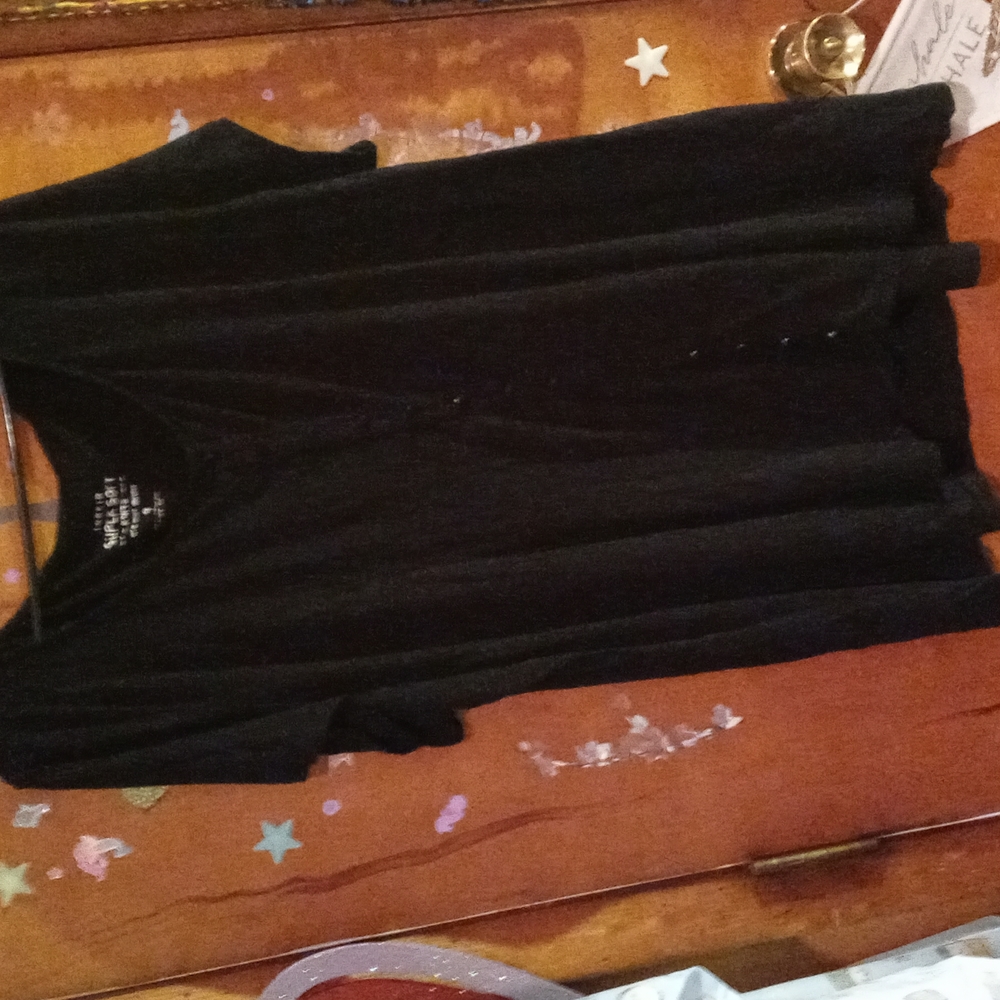 Torrid super soft knit tee shirt with false buttons going on size 4